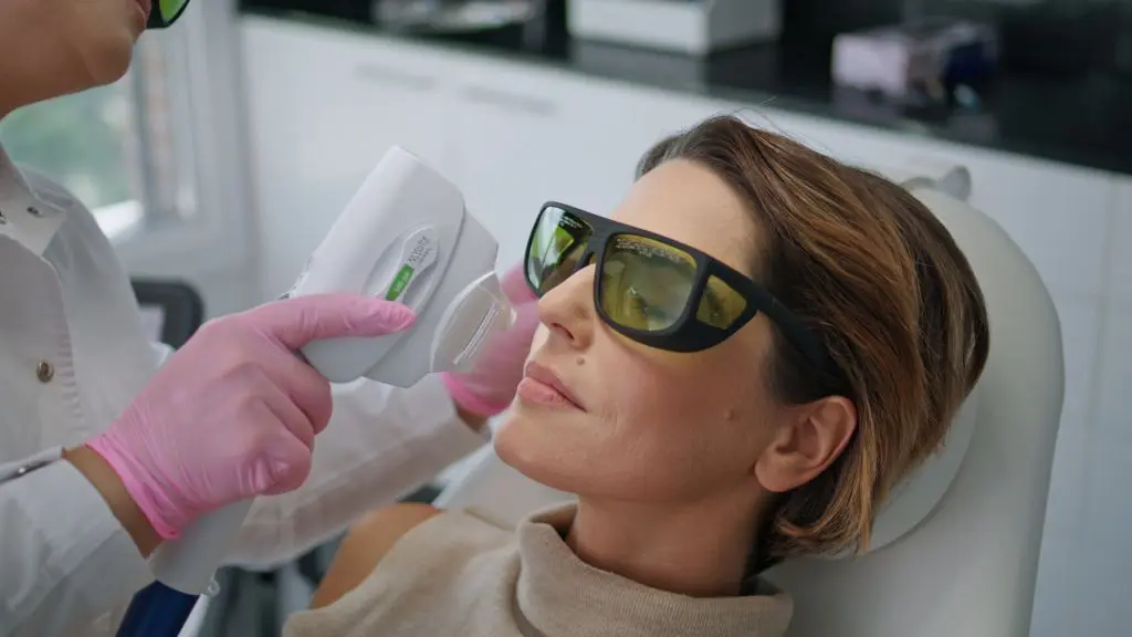laser | Contour Dermatology woman getting laser treatment