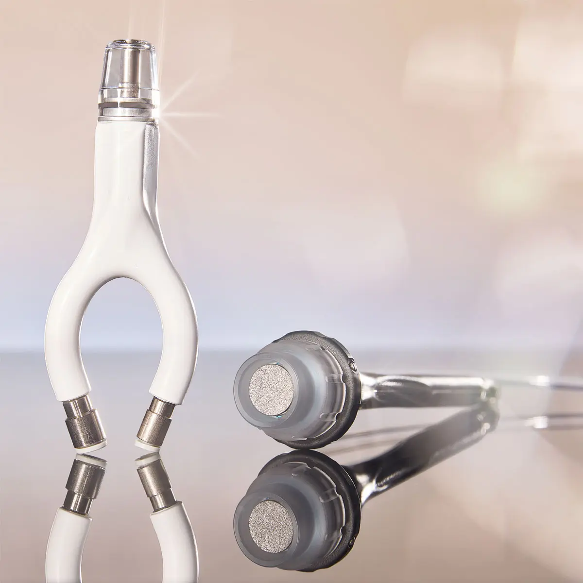 DiamondGlow facial device applicators used for exfoliation, extraction, and serum infusion.